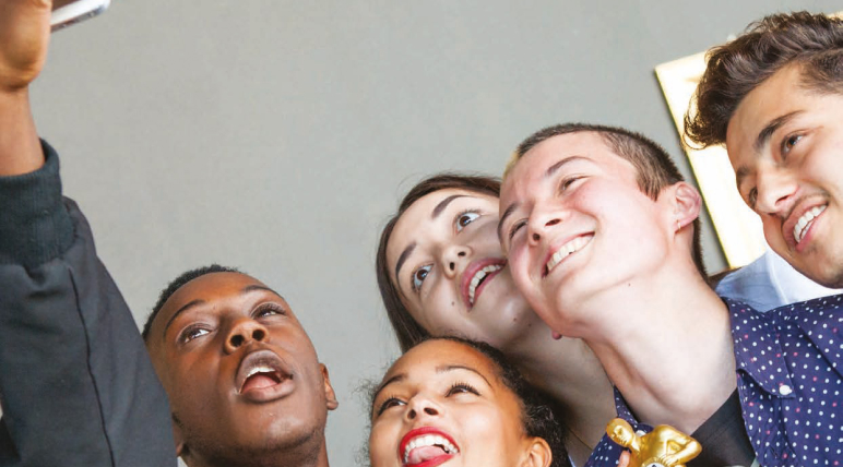 Group of children taking selfie