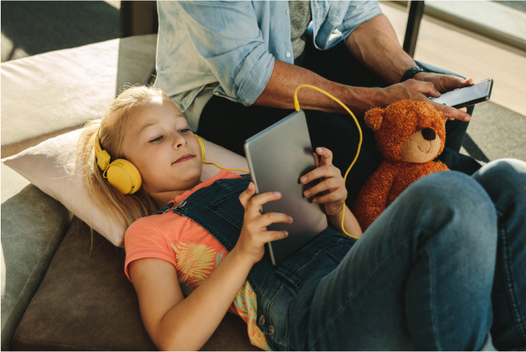  Girl on tablet with father