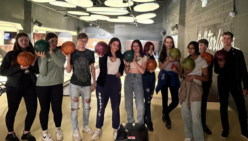 Young people at bowling alley